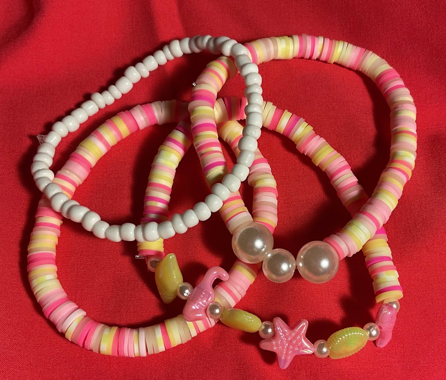 Ocean shells with pink and yellow accents stacker set of 5 Bracelet