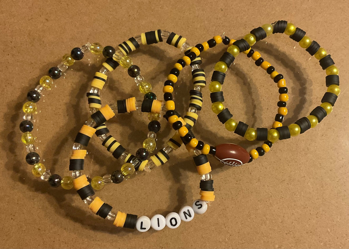 Lions black and yellow gold football stacker set of 5 Bracelets