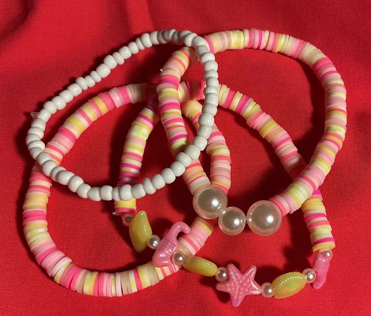 Ocean shells with pink and yellow accents stacker set of 5 Bracelet