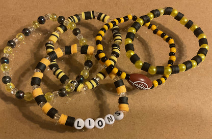 Lions black and yellow gold football stacker set of 5 Bracelets