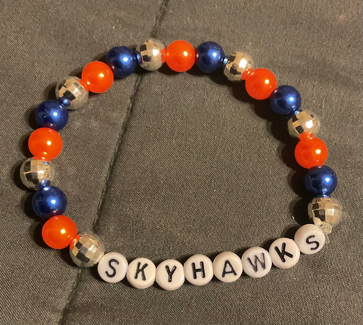 UT Martin Skyhawks disco ball bracelet on 7 inch elastic thread. Adjustable.