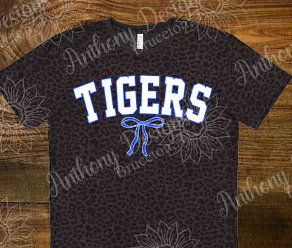 Tigers with bow. Blue and white. On black leopard print unisex shirt.  School spirit. Can be modified for your school. Adult sizes.
