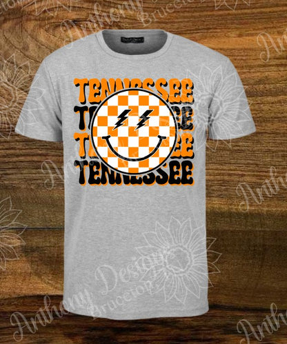 Tennessee. Checkered smiley face. Orange and White. Tennessee Vols Volunteers spirit inspired designed shirt