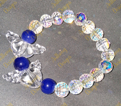 Clear Hearts with wings  royal blue  bracelet on 7 inch elastic thread. Adjustable.